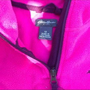 Pink fleece jacket.